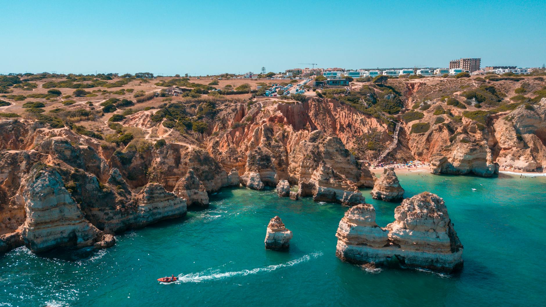 Algarve coast cliffs — one of the most stunning regions for Brazilian expats seeking sunshine and beach life