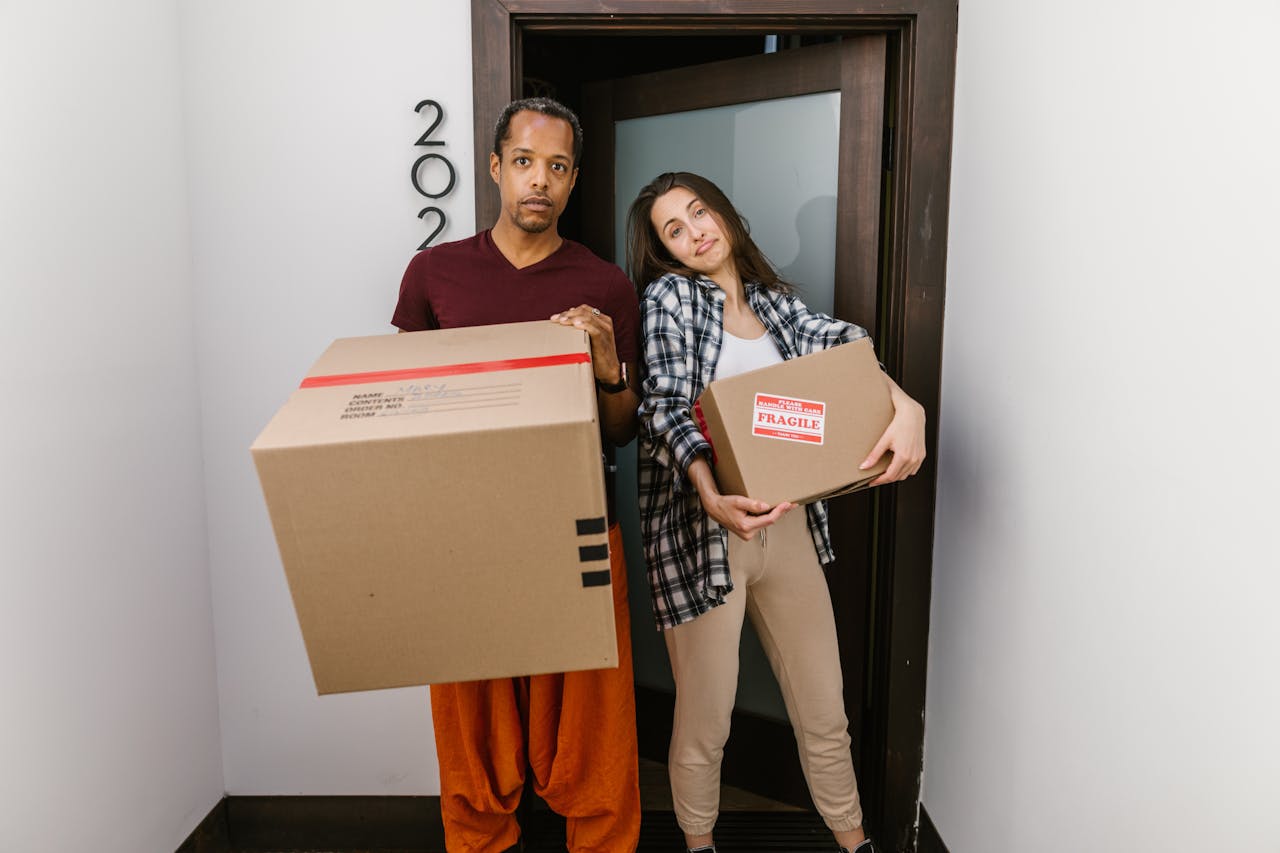 Moving boxes in a bright apartment