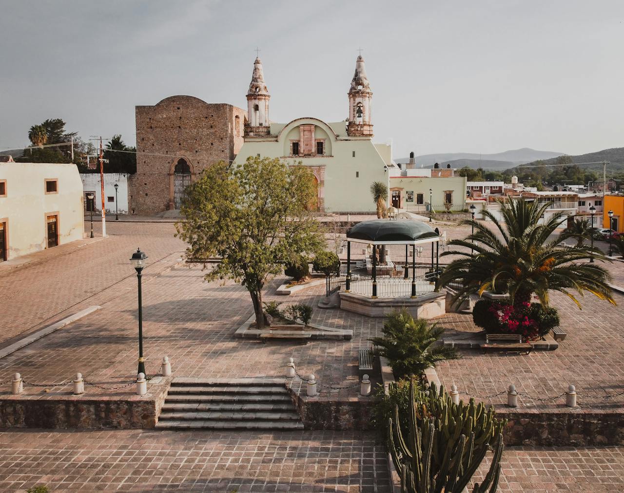 Mexican colonial town plaza with cathedral
